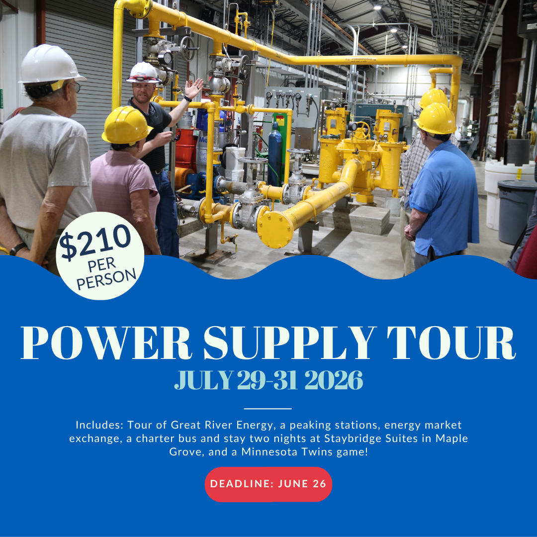 Power supply tour post with people standing in a peaking plant