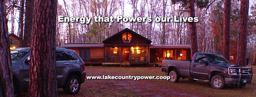 Cabin in woods with evening lights